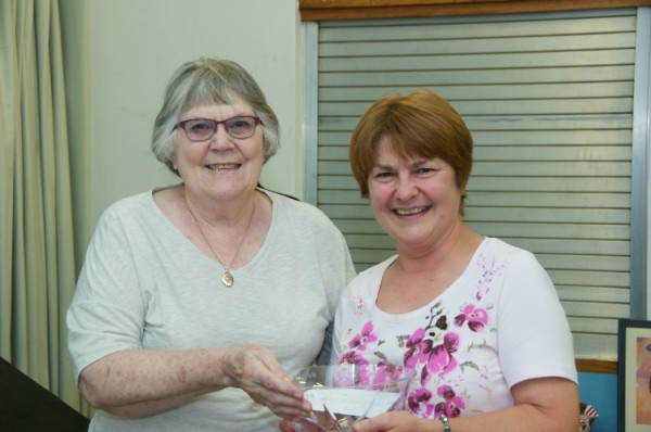 Alicia CLyant presenting bowl to Jeanette Holdstock